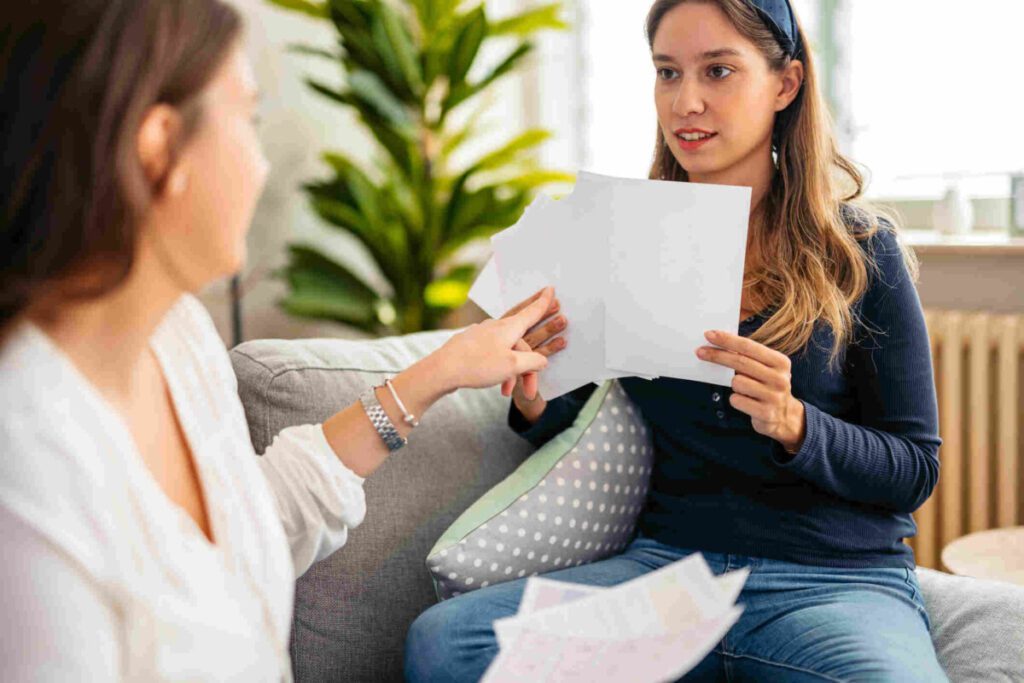 daughter and mum, trying to decide what option to take after GCSE results day.